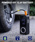 Cordless Tire Inflator With Gauge On The Go Mini Air Compressor next to car tire, powered by built-in 12.6V battery.