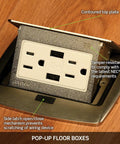 Pop Up Floor Box With 20 Amp Tamper Resistant Outlet Brushed Nickel PFTR2 BN open on wood floor showing features.