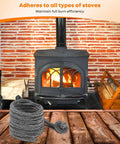 Wood stove gasket rope, gray graphite-impregnated fiberglass, 1/4 in x 84 in coil, front view with stove in background.