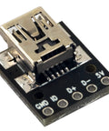 Close-up of Mini USB Breakout Board Female Connector 5 Pins 0.1 Inch Pitch 150 Mils PCB, straight pin headers visible.