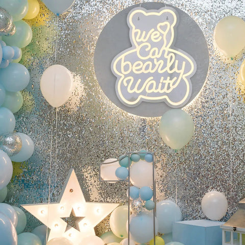 Bear Shaped Neon LED Sign For Wall Decor Lights Up Your Party Vibe With Warm White Glow at an event with balloons and decorations