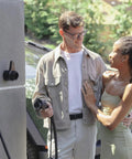 Couple with Beefy Hardwired Level 2 Electric Vehicle Charging Station mounted on wall, showcasing J1772 connectivity.