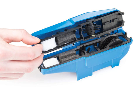 Open CM25 Professional Chain Scrubber Tool For Bike Chains Shop Grade With Four Sided Scrubbing Action showing interior brushes.