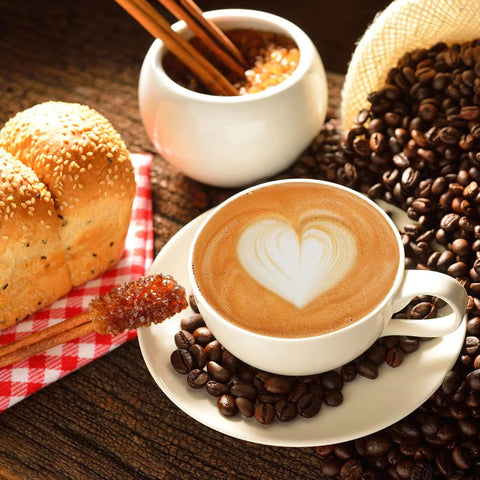 Cappuccino with heart design from Latte Art Stencil Set With 72 Pieces In 36 Patterns Plus 2 Latte Art Pens and baked bread