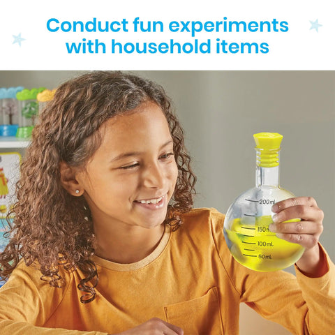 Child holding flask from Starter Science Measuring Flasks Set For Kids Kid Friendly Plastic Beaker Kit for experiments and play.