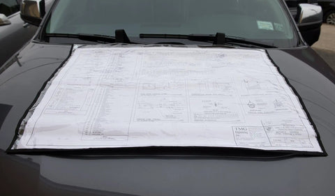 Built Different Tough Blueprint Cover Protector And Plan Sleeve For 36X48 Arch Drawings Posters Maps With Clear Window on a vehicle.