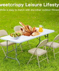 Four Foot Go To Folding Picnic Table With Carrying Handle Easy To Fold And Store Portable Lightweight Table with food outdoors.