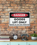Goods lift only danger sign on brick wall; not the Keep Out Zone Sign For 8x12 Inch Warehouse Equipment Access Restriction Heavy Duty Weatherproof Aluminum Plaque UV Printed Industrial Safety Marker For Outdoor Walls And Factory Floors.