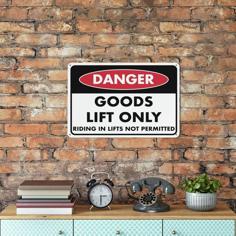Goods lift only danger sign on brick wall; not the Keep Out Zone Sign For 8x12 Inch Warehouse Equipment Access Restriction Heavy Duty Weatherproof Aluminum Plaque UV Printed Industrial Safety Marker For Outdoor Walls And Factory Floors.