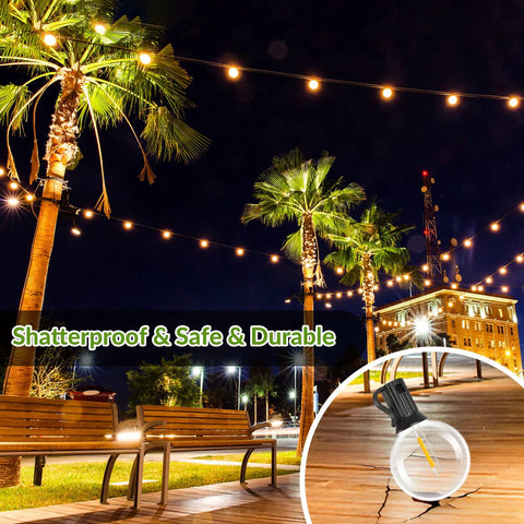 100Ft Solar String Lights With 52 LED Globe Bulbs, Warm 2700K Glow, Shatterproof Outdoor Hanging Lights on palm trees