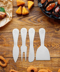 Cheese Knife And Butter Fork Set Stainless Steel With Easy Cutting And Easy Cleanup, displayed on rustic table.