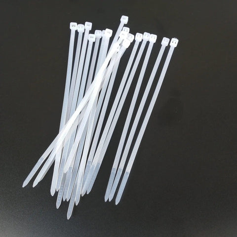 Heavy Duty 4 Inch Cable Ties 500 Pack With 40 Lbs Tensile Strength UV Resistant Self Locking Nylon Zip Ties on black background