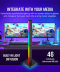 Add A 422mm Smart Lighting Tower With 46 Custom LEDs To Level Up Your RGB Setup And Flood Your PC Desk With Immersive Diffused Color Lighting For Gaming Rigs And Workstations displaying vibrant colors next to dual monitors.