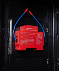 Automatic Car Fire Extinguisher 40g Aerosol Engine Bay Guard in red with blue wires mounted on black surface.