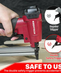 Close-up of Rock Solid Pneumatic Staple Gun For Carpentry And DIY Projects Smooth Shooting 22 Gauge Air Powered Crown Nailer with double safety trigger.