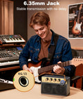 Musician playing guitar with Portable 10W Electric Guitar Amplifier With Clean Drive Channel Pure Analog Tone USB C Rechargeable Bluetooth