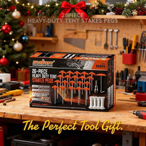 Box of 26-piece heavy-duty tent stakes pegs on a festive decorated table with tools in a workshop