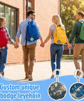 Group of people holding hands with backpacks, each displaying a badge from the 100 Sets Button Maker Kit With 58mm Shells And 1.98 Inch Keychain Rings