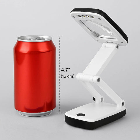 Pocket Magnifier With Light And Stand 3X Magnification beside a 4.7 inch red soda can for size comparison