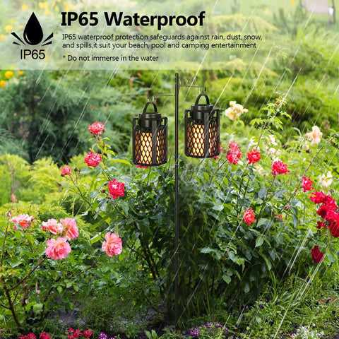 Lit LED Atmosphere Speaker 2 Pack Waterproof Outdoor Bluetooth Speaker With Torch Light and LED Lantern in garden setting