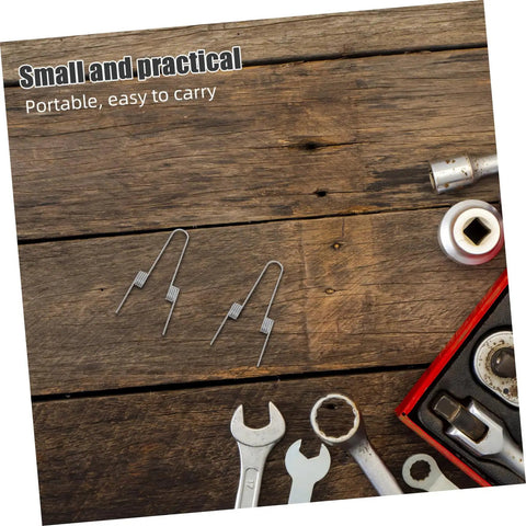 Upgrade Your Kitchen With 4 Pack Stainless Steel Dual Torsion Spring Kit For Garbage Can Press Top Lid, Smooth Silent Lid Operation, Easy DIY Fix For Trash Bin Repair And Maintenance. Small stainless steel torsion springs on wood with tools.