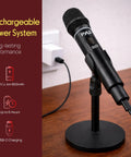 Wireless USB Microphone System With 16-Channel UHF Dial on a stand, showcasing USB-C charging and rechargeable power.
