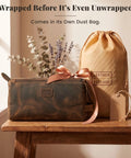 Top Shelf Genuine Buffalo Leather Toiletry Bag For Men And Women Brown Travel Organizer With Waterproof Inner Compartment on a table.