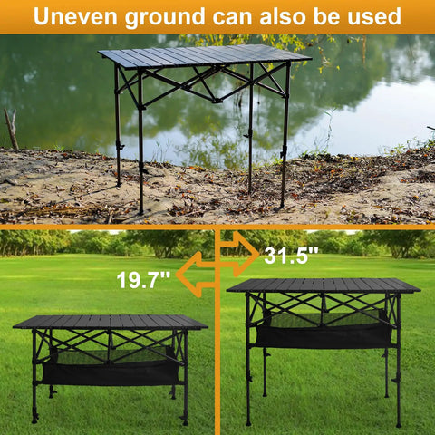 Folding Camping Table with Roll Up Top Height Adjustable Portable Metal Camp Table setup by a lake and on grass, 37.4 inch surface.