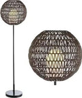 Outdoor Woven Globe LED Floor Lamp In Coffee Black Finish with iron frame and wicker globe shade, LED bulb visible inside.