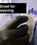Gloved hand using Fiberglass Cloth Repair Kit 8 Sq Ft 46.5 By 25 Inches Heavy Duty Waterproof Reinforcement on blue surface.