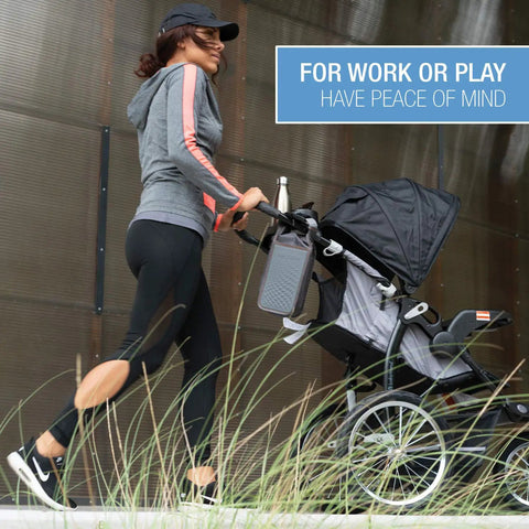 Woman walking with stroller featuring safebox portable safe with 3 digit resettable combination lock, slash resistant material, attached