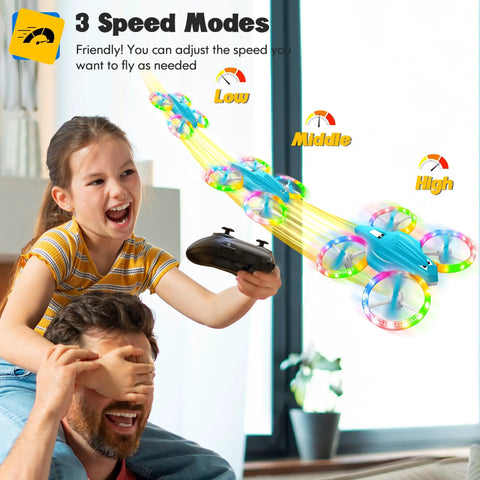 Girl playing with Light Blue Kids Drone With 3D Flip And Cool Light indoors, showing 3 speed levels and colorful lights.