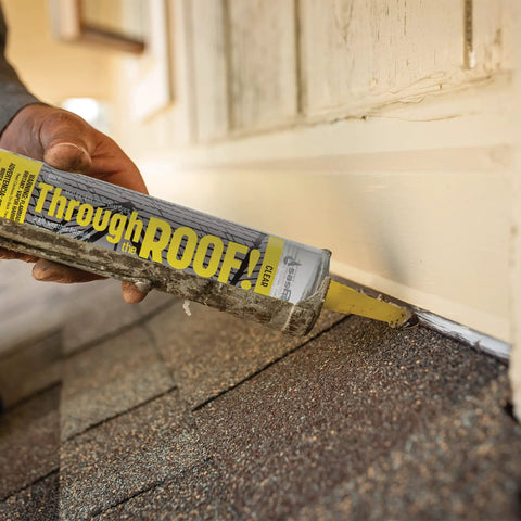 Applying Through The Roof Sealant 10.5 Oz Cartridge Clear That Stays Crystal Clear With Elastic Flex For Temperature Changes UV Resistant And Strong Adherence To Existing Roof Patches on shingles.