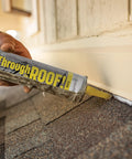 All Weather Clear Roof Sealant 10.5 Oz Cartridge Pack Of Twelve Waterproof Leak Stopper dispensing sealant on shingles.