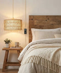 Handcrafted Boho Plug In Pendant Light With Artisan Woven Shade, Easy Three Way Switch, Extended Cord For Serious Chill Living Room Aura And Definitely Solid Decor Flex Year Round hanging over a bed.