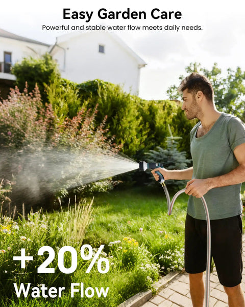 Person using Retractable Garden Hose Reel 100 Feet One Half Inch With Pro Metal Shaft Tough As Nails Heavy Duty Automatic Rewind
