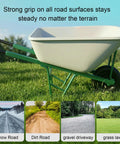 No Flat 13 Inch 4.00-6 Wheelbarrow Tire And Wheel 2 Pack shown on a green wheelbarrow, versatile on various terrains.