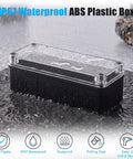 Rugged IP67 Waterproof Junction Box With Clear Top And Drop Dead Tough ABS Shell, 80x250x70mm, shown in rain.