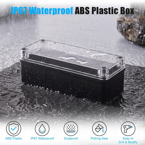 Rugged IP67 Waterproof Junction Box With Clear Top And Drop Dead Tough ABS Shell, 80x250x70mm, shown in rain.