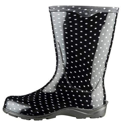 Women Mid Calf Waterproof Garden Rain Boots With Killer Traction And Legit All Day Comfy Support Insole For Yard Work Or Rainy Days Snazzy Black And White Polka Dot Style Made Stateside True To Size side view of glossy rain boot with polka dots