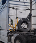 Semi-truck with Safe Spiral Pre Cut Spiral Wrap For Hoses And Cables Black HDPE 1.25 Inch OD By 20 Feet Pre Cut Length