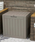 Lockable Outdoor Deck Box For Patio Storage Weather Resistant 32 Gallon Faux Plank Driftwood Finish beside wicker chairs