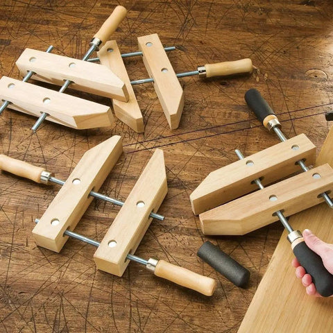 12 Inch Wooden Handscrew Clamp Set With Angled Jaws For A Grip Like A Champ On Multiple Surfaces DIY Ready Heavy Duty Wood Clamps For Precise Joinery And Woodworking Vises, shown on a wooden table.