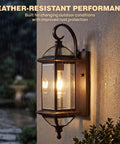 Solid Copper Dusk To Dawn Outdoor Wall Light With Clear Beveled Glass In Oil Rubbed Bronze, 18.5 Inch Exterior Wall Sconce illuminated at night