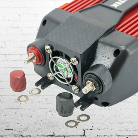 Close-up of Heavy Duty 1500W Power Inverter DC 12V to AC 110V Car Converter showing fan and terminal connections.
