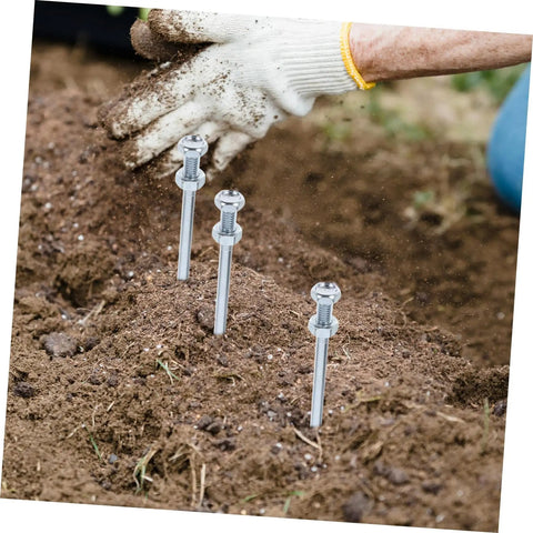 Heavy Duty Lawn Aerator Shoes With Metal Spikes, 7 Cm Deep Penetration, person wearing glove handling soil with spikes inserted