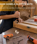 Person assembling furniture with cross dowel slotted nuts and tools; 20 Pack M6x10mm Barrel Nuts Cross Dowel Slotted Hardware Zinc Alloy
