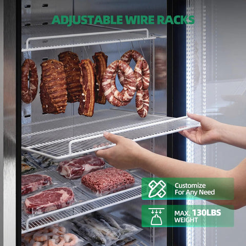 Adjustable wire racks in the Heavy Duty Three Door Glass Display Freezer holding various meats for retail use.
