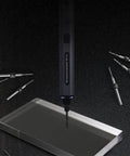 Electric drill with PCB Micro Drill Bit Set 0.5mm To 2.3mm Tungsten Carbide Jewelry Drill Bits around, on dark background.