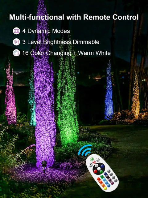 All-In-One RGBW Landscape Lighting Kit illuminating trees with multi-color LED spotlights and remote control in a garden setting